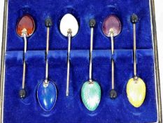 A boxed set of six silver & enamelled spoons