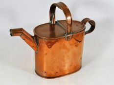 A 19thC. large copper water carrier