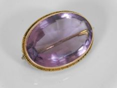 A Victorian 9ct gold mounted amethyst brooch