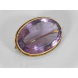 A Victorian 9ct gold mounted amethyst brooch