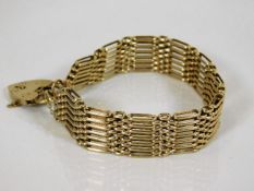 A seven bar 9ct gold gate bracelet