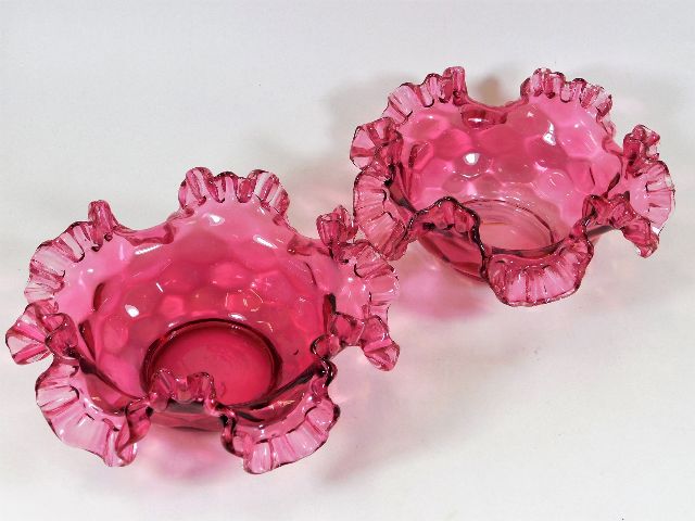 A pair of large crimped edge cranberry bowls