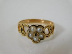 An early Victorian gold mourning ring with seed pe