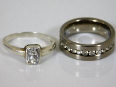 A silver fashion ring twinned with similar titaniu