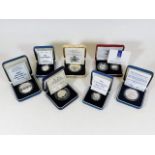 A quantity of seven boxed proof coins & sets