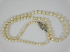 An antique set of pearls set with rose cut diamond