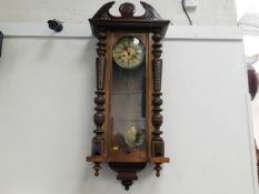 A mahogany cased German Vienna style wall clock