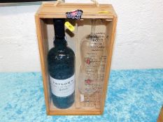 A Taylor's 2001 port with glasses in wooden case