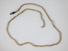 A 19thC. three strand natural seed pearl necklace