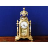 A 20thC. ornate brass Italian mantle clock
