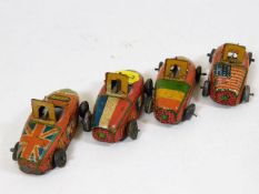 Four miniature tinplate toy cars