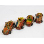 Four miniature tinplate toy cars