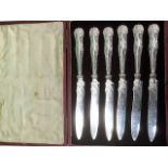 A set of six decorative Edwardian tea knives with