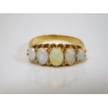 An 18ct gold five opal ring