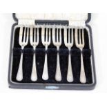 A boxed set of six silver pastry forks