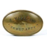 An antique brass snuff box inscribed T. Williams 1
