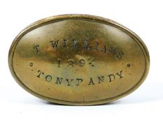 An antique brass snuff box inscribed T. Williams 1