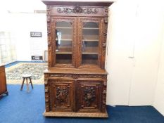 A late 19thC. French oak dresser decorated with ga