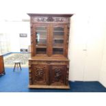 A late 19thC. French oak dresser decorated with ga