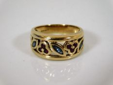A 9ct gold ring set with ruby & sapphire