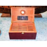 A large gloss finish cigar humidor