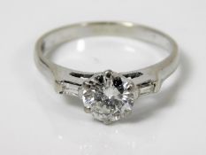 An 18ct white gold diamond solitaire ring with app