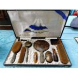 An early 20thC. tortoiseshell dressing table set w