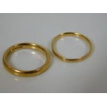 Two 22ct gold wedding bands