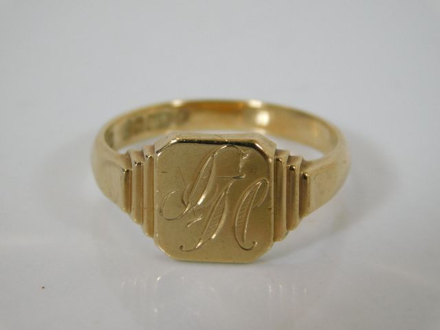 An inscribed 9ct gold signet ring