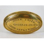 An antique brass snuff box inscribed John Smith Se