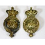 A pair of Victorian brass military badges