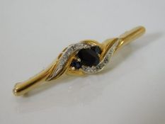 A 9ct gold sapphire & diamond brooch