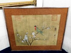 A Chinese hand coloured print of bird on floral br