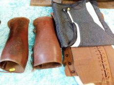 A set of vintage leather gators twinned with a twe