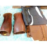 A set of vintage leather gators twinned with a twe