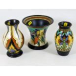 A Dutch pottery Gouda trio of vases
