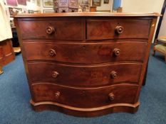 A 19thC. mahogany serpentine chest of drawers, cru