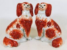 A pair of well detailed Staffordshire King Charles