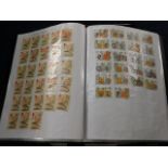 A boxed quantity of fourteen GB stamp albums