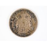 An 1867 silver Napoleon III silver five francs