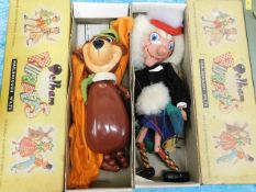 Two 1960's boxed Pelham puppets Yogi Bear & McBoozle