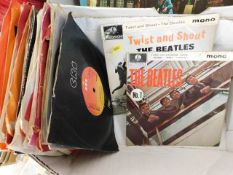 A small quantity of vintage vinyl singles includin