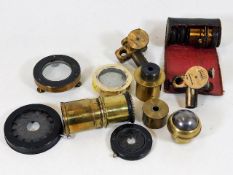 A small quantity of brass lenses & related items