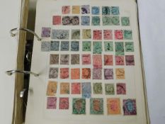 Three albums of mostly used stamps