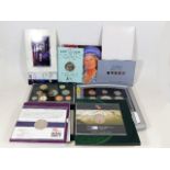 A quantity of various commemorative coin sets & si