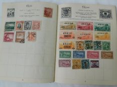 Four small stamp albums & a quantity of loose stam