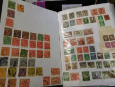 A boxed quantity of seventeen mostly GB stamp albu