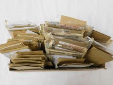 A boxed quantity of loose stamps