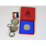 A silver commemorative medal, one other commemorat