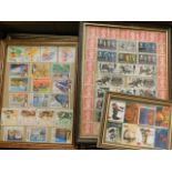 A boxed quantity of framed stamps